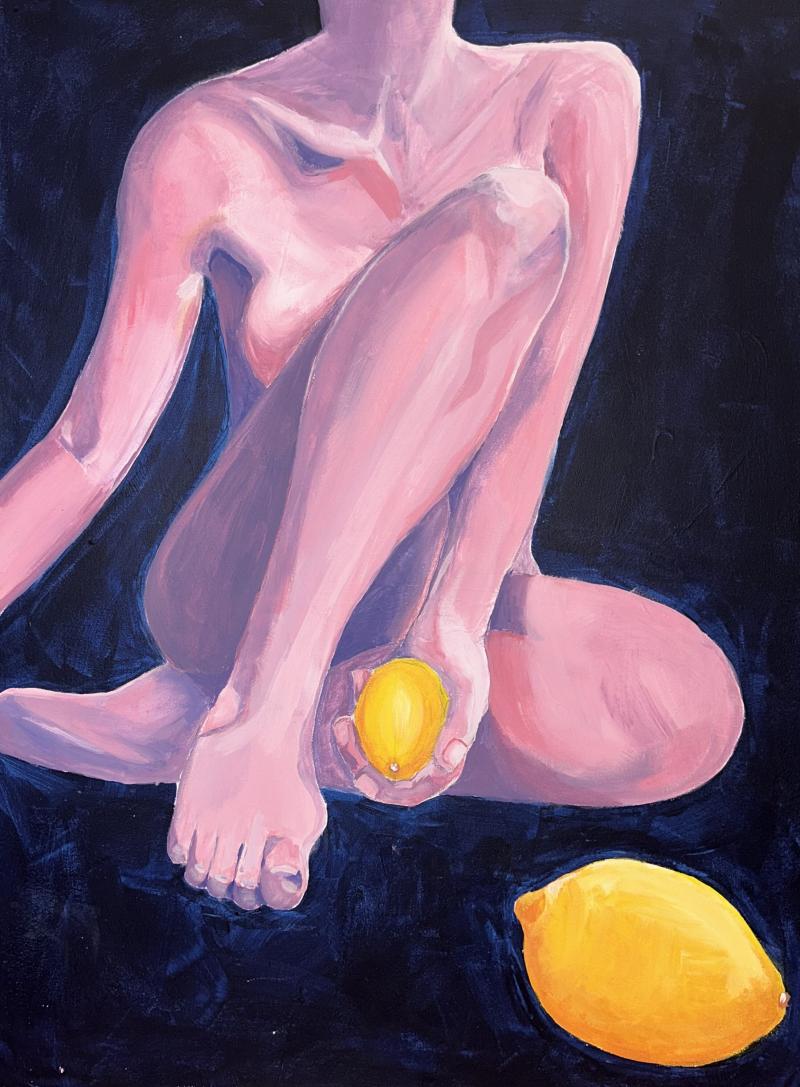 pink coloured nude female body sitting half crossed legged with one knee up covering her chest holding a lemon in front of her private parts and one lemon in front of her on dark blue background 