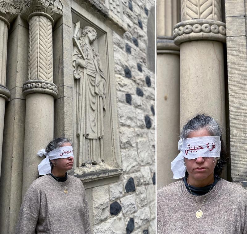 woman blindfolded in front of a church