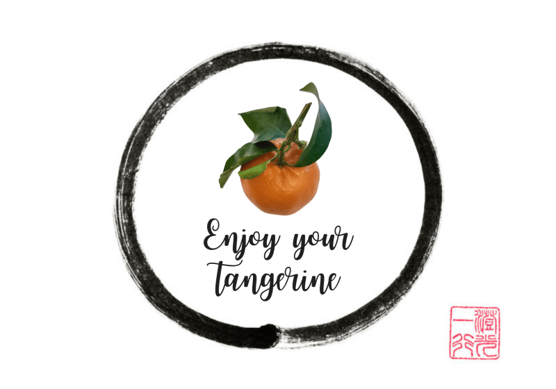 Image of a tangerine in a zen circle with the text "enjoy your tangerine"