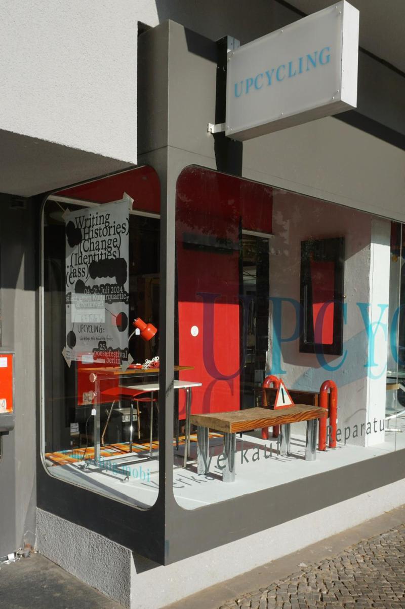 Street-facing window of the Upcycling workshop in Neukölln, Berlin