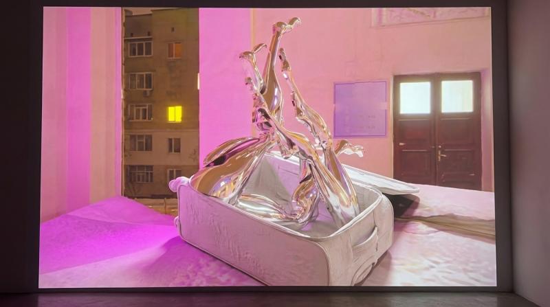 Chrome legs emerging from a plastered suitcase