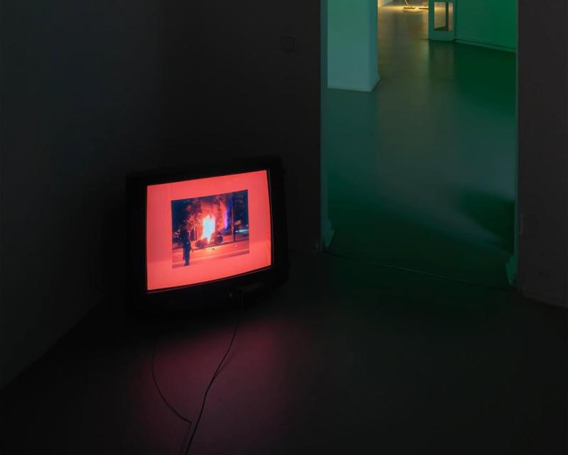 An analogue TV screen at Kunstraum Bethanien screening "Various Small Fires"